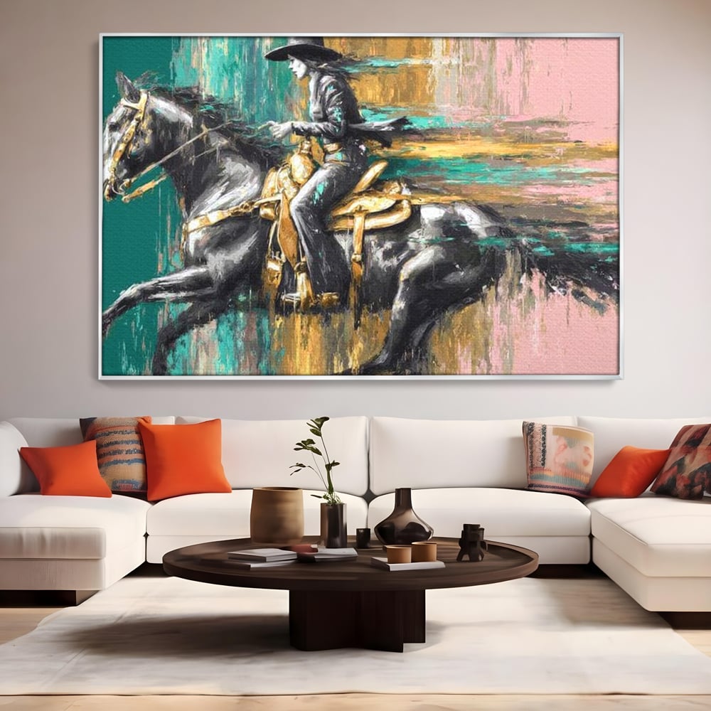 Tablou canvas cu pictura cu femeie calare pe armasar, in rama de aluminiu argintiu, pe perete intr-un living